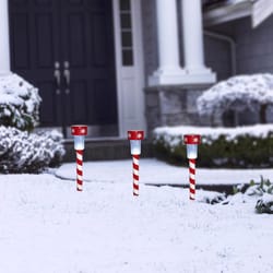 Alpine LED Cool White 14 in. Solar Powered Lighted Candy Cane Stake Pathway Decor