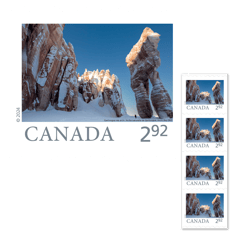Strip of four stamps featuring image of Qarlinngua sea arch in Arctic Bay, Nunavut.