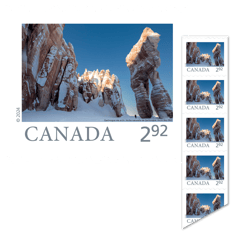 Strip of 10 stamps featuring image of Qarlinngua sea arch in Arctic Bay, Nunavut.