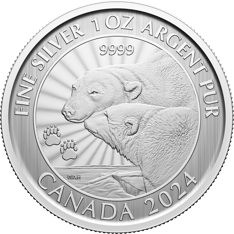 The reverse design by Canadian artist W. Allan Hancock shows a polar bear mother and her almost independent cub nuzzling in their Arctic habitat.