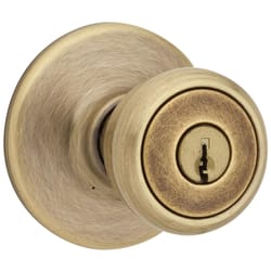 Kwikset Tylo Antique Brass Entry Door Knob 1-3/4 in.