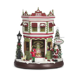 Roman Confetti Lite LED Multicolored Musical Sweet Shop 2 Story Christmas Village 10.25 in.