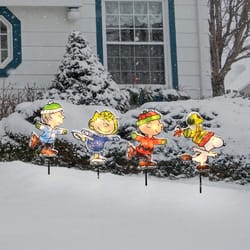 Peanuts LED Pre-Lit Skating Peanuts 26 in. Pathway Decor