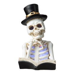 Glitzhome Multicolored 10 in. LED Prelit Skull Reading Book Halloween Decor