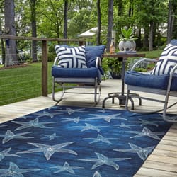 Linon Home Decor Walman 5 ft. W X 7 ft. L Blue Star Fish Polyester Accent Rug