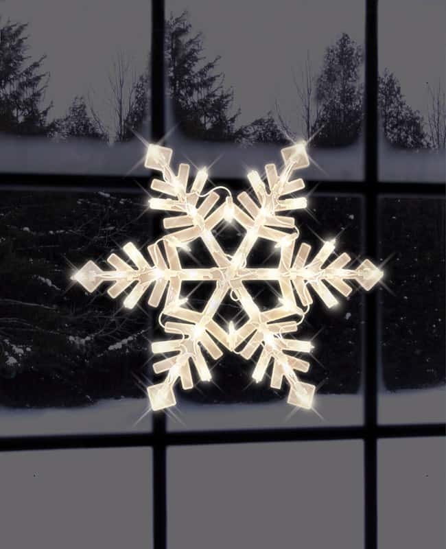 Winter stained glass snowflakes using tissue paper and clear contact paper.  I cut snowflakes ah…