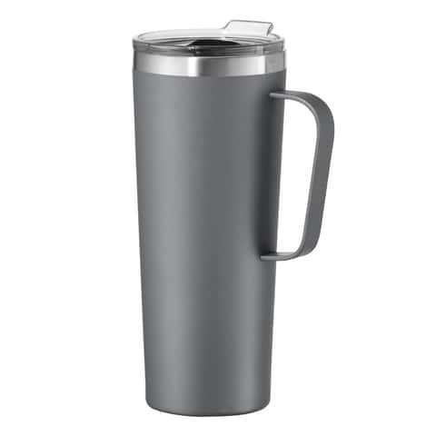 Thermos and Mug with Hot Drink Standing on Wet Wooden Table after