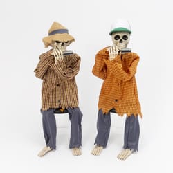 Gerson 38 in. Animated Skeleton Shelf Sitter Playing Harmonica Tabletop Decor