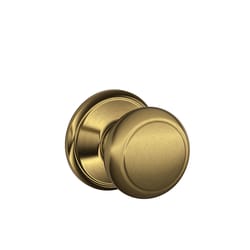 Schlage F Series Andover Antique Brass Passage Knob 1-3/4 in.