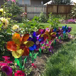 In The Breeze Multicolored Mylar 16 in. H X 8 in. W Flower Pinwheels Garden Stake Spinner