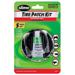 Patching inflatable mattress with tire patch kit. 