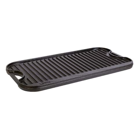 Lodge Reversible Pro Grid Iron Grill/Griddle on a glass-top stove