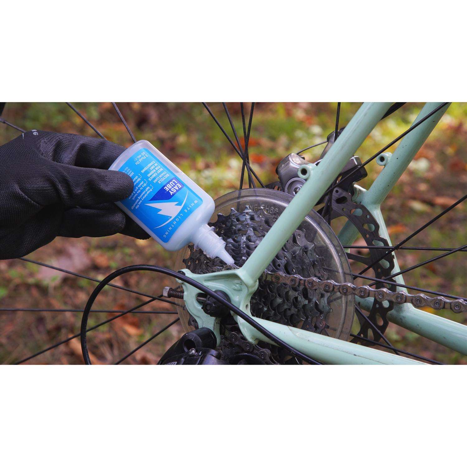 No more wet cardboard or getting lube on tires. Homemade reusable  plexiglass tire shield for chain maintenance. : r/motorcycles