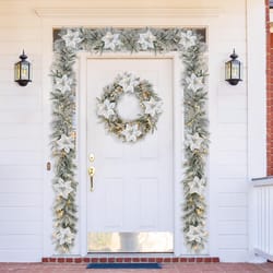 Glitzhome 9.75 in. D X 9 ft. L LED Prelit Warm White Snow Flocked Pine Poinsettia Garland