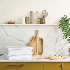 Materials staged in kitchen for making homemade pizza