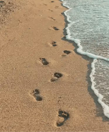 footsteps on beach sand