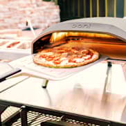 pizza coming out of Ooni Koda 16