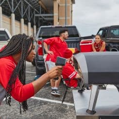 IR thermometer being used at a tailgate