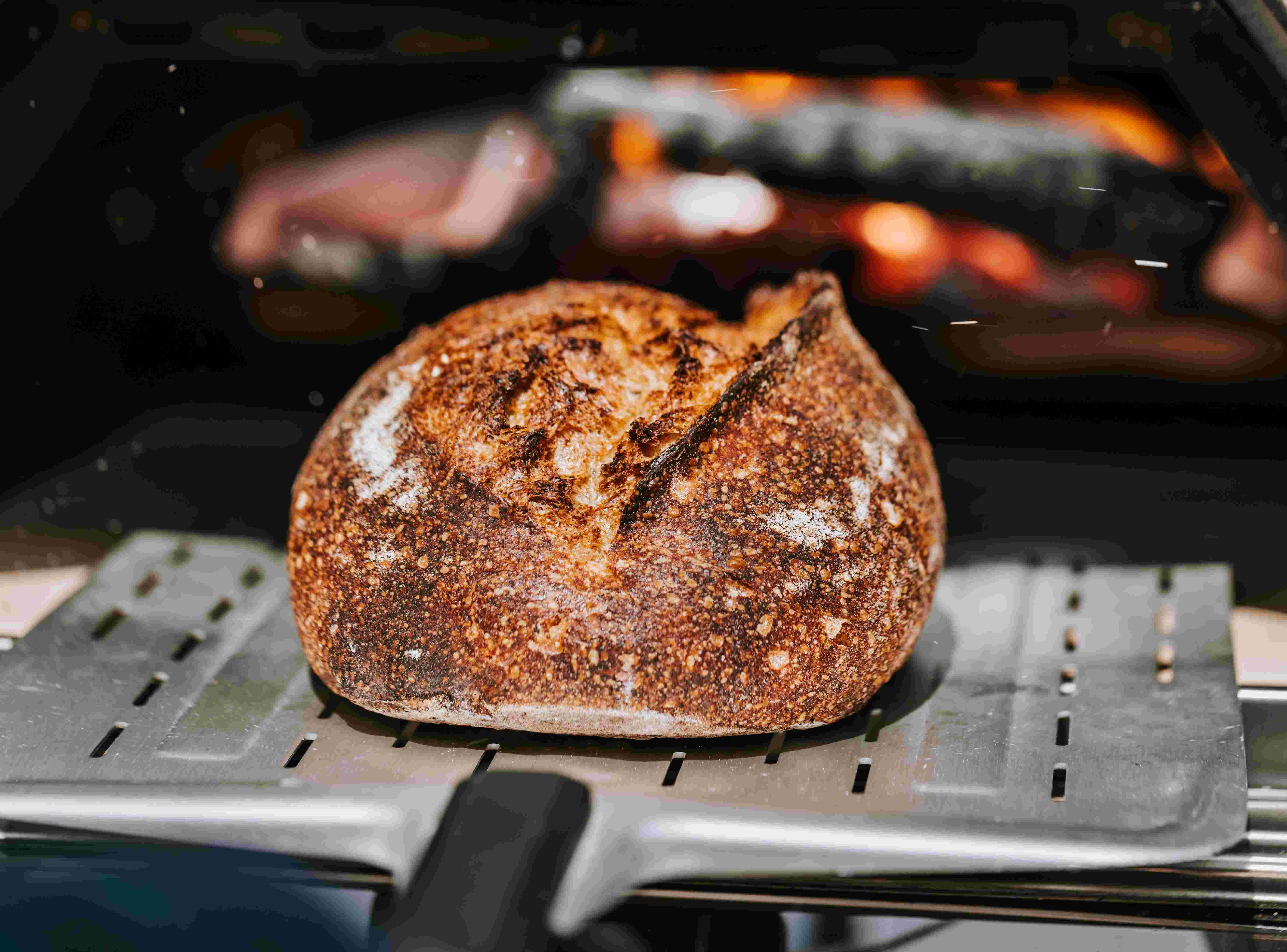 Bread being baked in Ooni Karu 16