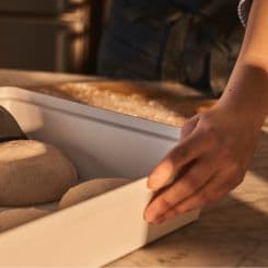 Pizza dough being stored in the Ooni dough box