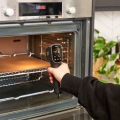 Ooni IR thermometer being used in any oven