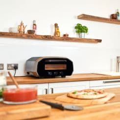 Ooni volt oven sitting on kitchen counter