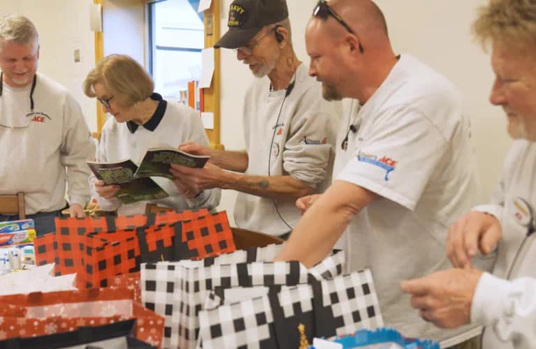 Ace employees making gift bags