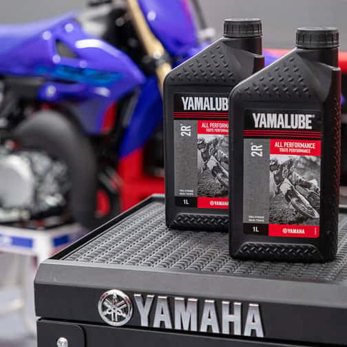 Yamalube oil pouring into engine