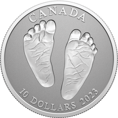 A pure, silver coin depicting a pair of baby feet. &quot;Canada,&quot; &quot;10 dollars,&quot; and &quot;2023&quot; text surrounds the edge.
