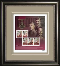 Art in a black frame. Depicts a collage with 5 stamps of 3 Canadian Victoria Cross recipients, the medal, and their silhouettes. 