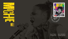 Front features a black and white photo of Michie Mee against a black background. Features “Michie Mee” in yellow text, the stamp and turntable cancel.