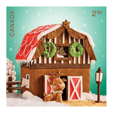 Stamp image featuring gingerbread barn with red icing roof and white trim, and green wreaths against green background. Reindeer outside door.