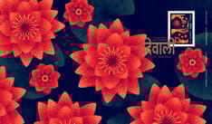 Front features illustration of lotus flowers, Diwali stamp, and gold cancel mark of the word “Diwali” in Hindi.