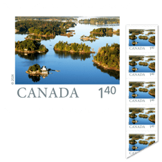 Bande de 10 timbres au tarif des envois à destination des États-Unis portant une image aérienne des Mille-Îles en Ontario.