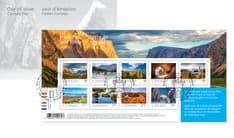 Bloc-feuillet présentant une photo du parc national des Monts-Torngat et les neuf timbres Terre de nos aïeux sur une enveloppe blanche. 