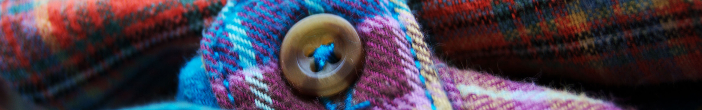 Close up of flannel shirts in a neat stack