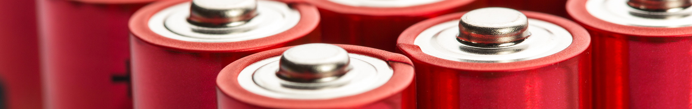 Package of red tipped batteries lined up in clean rows